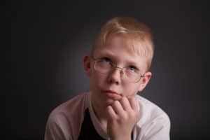 Boy wondering about asking questions